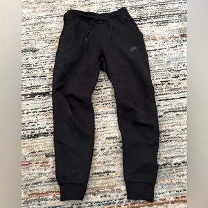 OVER 75% OFF Nike tech pants great for back to school